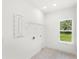 Laundry room with tiled floors, a window, and a utility sink hook-up at 634 Burch Ave, Winter Garden, FL 34787