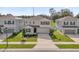 Charming two-story home featuring a well-manicured lawn and inviting curb appeal at 1069 River Otter Way, Deland, FL 32720