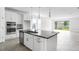 Kitchen with island featuring a sink, stainless steel appliances, and plenty of counter space at 5249 Stone Ridge Pl, St Cloud, FL 34771