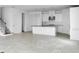 Open living area featuring tile flooring, access to kitchen, and staircase at 5249 Stone Ridge Pl, St Cloud, FL 34771