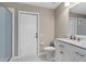 Well-lit bathroom with tiled walk-in shower and marble vanity at 11045 Belmere Isles Ct, Windermere, FL 34786
