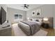 Comfortable main bedroom with neutral tones, natural light, and stylish furnishings at 13356 Sw 64Th Street Rd, Ocala, FL 34482