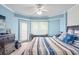 Spacious bedroom with a king-size bed and private access to balcony at 4670 Links Village Dr # B405, Ponce Inlet, FL 32127