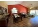 Open-concept living area with dining space and a living room that leads to a patio at 2939 Falling Tree Cir, Orlando, FL 32837