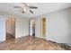 Spacious bedroom with double closets and wood floors at 4621 N Pine Hills Rd # 113, Orlando, FL 32808