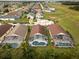An overhead view of screened-in pools, providing a private outdoor space in a neighborhood with ample green space at 246 Kimberly Point Dr, Davenport, FL 33837