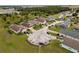 Neighborhood aerial view showcasing homes with screened-in pools and well-maintained landscaping at 246 Kimberly Point Dr, Davenport, FL 33837