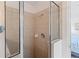 Tiled shower with clear glass enclosure at 246 Kimberly Point Dr, Davenport, FL 33837