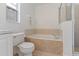 Bathroom features separate shower and soaking tub at 246 Kimberly Point Dr, Davenport, FL 33837