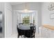 Bright eat-in kitchen area with view of backyard pool at 246 Kimberly Point Dr, Davenport, FL 33837