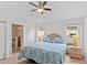 Cozy main bedroom with ensuite bathroom and windows for natural light at 246 Kimberly Point Dr, Davenport, FL 33837