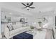 Bright open-concept living and dining area featuring modern finishes and ample natural light at 920 S Solandra Dr, Orlando, FL 32807