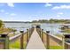 Private dock with gazebo on a calm lake at 13016 Shady Retreat Loop, Clermont, FL 34711