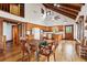 Open kitchen features wood cabinetry, appliances, and dining area at 2459 Adelia Blvd, Deltona, FL 32725