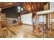 Spacious living room with beautiful hardwood floors, fireplace, and custom wood details at 2459 Adelia Blvd, Deltona, FL 32725