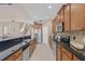 Well-lit kitchen featuring granite countertops, stainless steel appliances, and ample storage space at 2717 Eagle Cliff Dr, Kissimmee, FL 34746