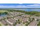 Scenic aerial view showcases community, lake, and sprawling landscapes at 1349 Mill Stream Ln, Winter Springs, FL 32708