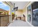 Balcony featuring outdoor seating and a TV at 1349 Mill Stream Ln, Winter Springs, FL 32708