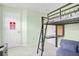 Bedroom with bunk bed, built in desk and chair with no parking sign on door at 1349 Mill Stream Ln, Winter Springs, FL 32708