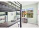 bedroom featuring a bunk bed with a desk at 1349 Mill Stream Ln, Winter Springs, FL 32708