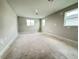 Bright, airy bedroom featuring multiple windows providing ample natural light and space at 2564 Hawks Overlook Pl, Oviedo, FL 32765