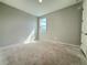Cozy bedroom with natural light highlighting its clean, simple design and single window at 2564 Hawks Overlook Pl, Oviedo, FL 32765