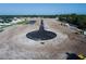 New residential development construction site with utilities in place and roads built, surrounded by homes at 2564 Hawks Overlook Pl, Oviedo, FL 32765