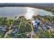 Aerial view of a lakefront property showing the surrounding area, water access, and proximity to a large lake at 1322 Susannah Blvd, Orlando, FL 32803
