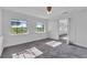 Sunny bedroom with large windows and soft carpet at 1322 Susannah Blvd, Orlando, FL 32803