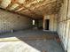 Unfinished basement showing block walls, insulation and wood beams at 2684 Great Heron Ave, Saint Cloud, FL 34773