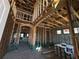 Interior view showcasing the wooden frame construction with an arched doorway at 2684 Great Heron Ave, Saint Cloud, FL 34773