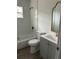 Bathroom featuring wood-look floors, modern vanity, and tub/shower combo at 3505 Pine Ridge Ct, Orlando, FL 32808