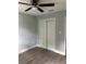 Bedroom with ceiling fan, wood-look floors, large closet at 3505 Pine Ridge Ct, Orlando, FL 32808