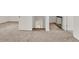 Spacious bedroom showcasing neutral carpeting and ample closet space at 500 N 13Th St, Leesburg, FL 34748