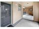 Apartment entryway showing unit door with lock and hallway view at 907 Charo Pkwy # 923, Davenport, FL 33897