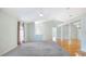 Spacious living room with vaulted ceilings, an open floorplan, and hardwood floors at 5825 Princess Caroline Pl, Leesburg, FL 34748