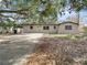 Updated single story home with a large front yard and mature shade tree at 1111 N Hart Blvd, Orlando, FL 32818