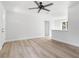 Bright living room with vinyl flooring and ceiling fan at 1111 N Hart Blvd, Orlando, FL 32818