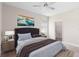 Bright bedroom with plush bed and ensuite bathroom at 1201 W 9Th St, Sanford, FL 32771