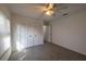 Bright bedroom featuring a ceiling fan, closet, and neutral carpet at 4423 Real Ct, Orlando, FL 32808