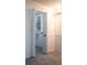 Bright walk-in closet with built-in shelving at 4423 Real Ct, Orlando, FL 32808