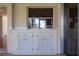 Sunroom with tiled floor, white cabinets, and a window at 4423 Real Ct, Orlando, FL 32808