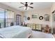 Bright bedroom with a comfortable bed and plenty of natural light at 906 Charo Pkwy # 433, Davenport, FL 33897