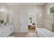 Spa-like bathroom featuring a soaking tub and marble accents at 1020 W Princeton St, Orlando, FL 32804