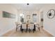 Bright dining room featuring a modern light fixture, stylish table setting, and windows at 1020 W Princeton St, Orlando, FL 32804
