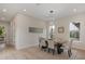 Bright dining room featuring a modern light fixture, stylish table setting, and windows at 1020 W Princeton St, Orlando, FL 32804
