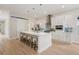 Bright, modern kitchen features a spacious island with seating and stainless steel appliances at 1020 W Princeton St, Orlando, FL 32804