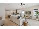 Inviting living room with a comfortable sofa, open to the kitchen, and great natural light at 1020 W Princeton St, Orlando, FL 32804