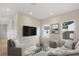 Comfortable living room featuring neutral decor, modern furniture, and plenty of natural light at 1020 W Princeton St, Orlando, FL 32804