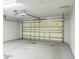 Clean two-car garage with an automatic door for easy access at 1928 Michigan Ct, Kissimmee, FL 34759